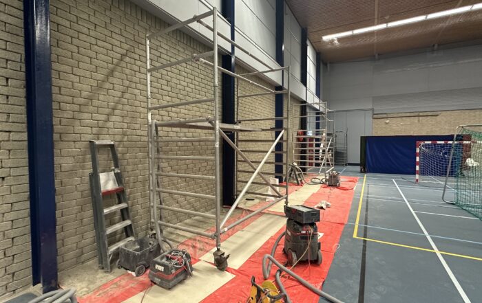Gevelrenovatie binnenmuren Sporthal Margriet in Schiedam